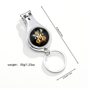 Close-up of a 3-in-1 silver nail clipper with bottle opener and letter M butterfly design