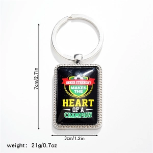 Dettaglio portachiavi calcio 7x3cm con scritta motivazionale per appassionati sport