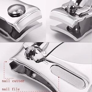 Macro detail of stainless steel nail cutter with integrated file and ergonomic lever
