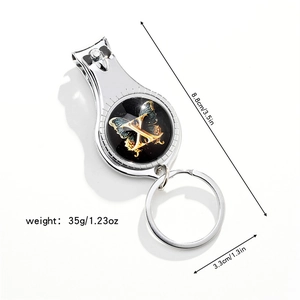 Macro detail of 3-in-1 multifunctional keychain with nail clipper and bottle opener