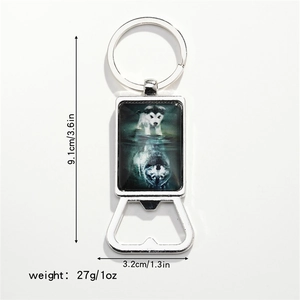 Dimensions of metal keychain bottle opener with dog and wolf reflection graphic