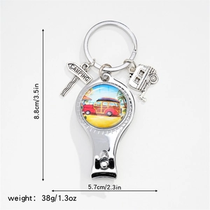 Detailed size view of multifunctional camping nail clipper keychain with caravan charm