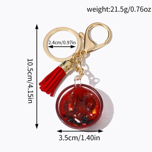 Miniature resin red bean soup bowl keychain with red tassel and golden lobster clasp