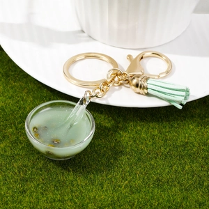 Creative realistic resin mung bean soup bowl keychain with green tassel and gold alloy clip
