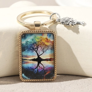 Golden Tree of Life rectangle keychain with artistic glass pendant and silver tree charm
