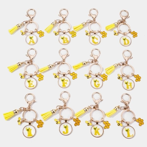 Bee themed acrylic keychain set with yellow tassel and honeycomb charm alphabet A to L