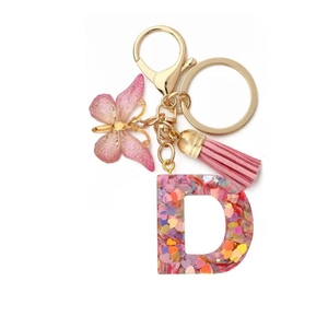 Pink heart sequin resin letter D keychain with butterfly pendant and gold hardware