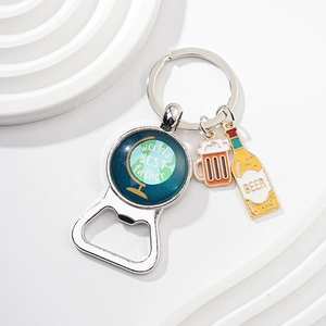 Detail of metal bottle opener keychain with World's Best Father globe and beer mug charms