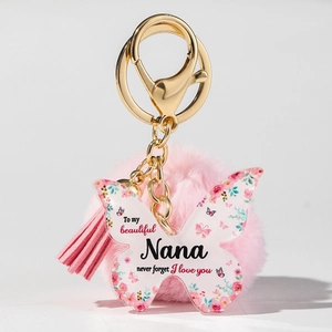 Detailansicht vom rosa Plüsch-Schlüsselanhänger mit Acryl-Schmetterling für Nana