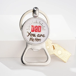 Detail of metal beer bottle opener keychain with Dad You Are My Hero engraving