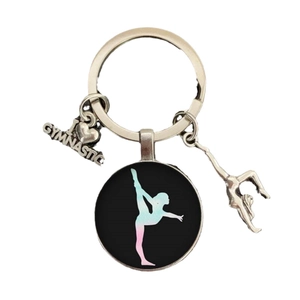 Creative I Love Gymnastics glass keychain with silver pendants and athlete silhouette