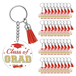 Macro view of 30PCS acrylic graduation keychains with red tassels and Class of GRAD logo