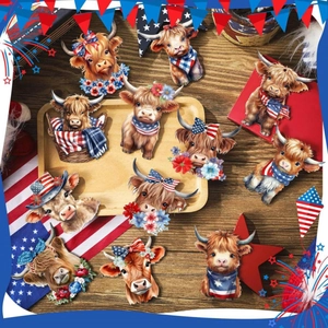 Flat lay of 4th of July highland cow acrylic charms with American flag patterns