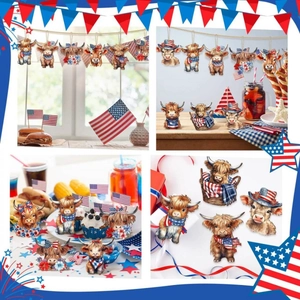 Detail view of 4th of July Highland cow themed party decorations with banners and cake toppers