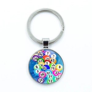 Retro zinc alloy bingo keychain with a round glass pendant featuring colorful number balls