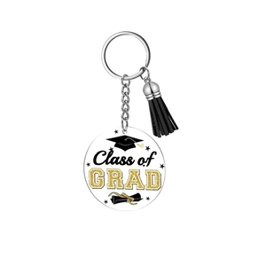 Detail of acrylic graduation keychain with Class of GRAD text and black tassel pendant