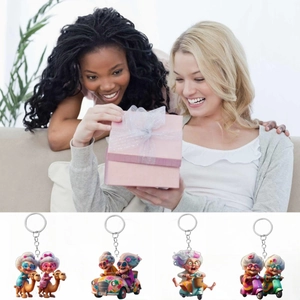Set of four 2D acrylic ornaments featuring trendy grandmas on scooters and cars