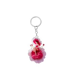 Detailed view of artistic acrylic keychain with girl in red petal dress on carnation