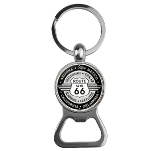 Macro detail of silver Route 66 bottle opener keychain with states name engraving