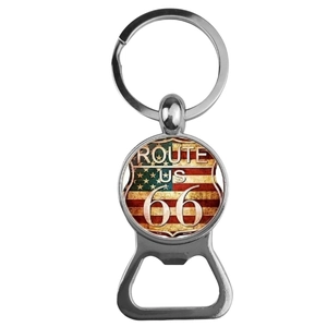 Detail of vintage Route 66 bottle opener keychain with American flag glass dome