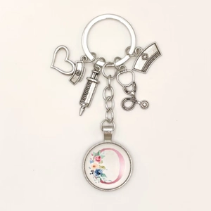 Nurse keychain featuring syringe stethoscope and pink floral letter C glass pendant