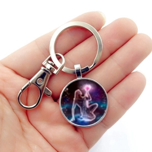 Artistic zodiac keychain with purple galaxy goddess glass cabochon and silver metal ring