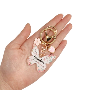 Porte-clés papillon en acrylique avec motif floral rose cadeau pour grand-mère