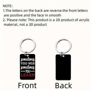 Detailed front and back view of rectangular black acrylic keychain with motivational quote