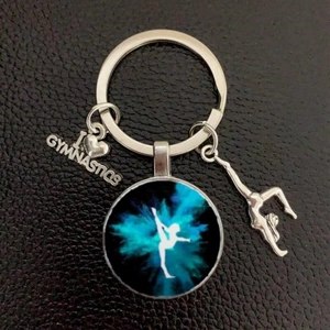 Gymnastics theme keychain with silver ring, glass pendant, and I love gymnastics heart charm
