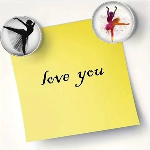 Detail of 25mm ballet theme glass magnets on yellow love you note for fridge or office