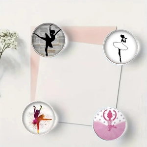 Detail of four ballerina glass magnets with diverse artistic styles for fridges and boards