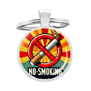 Detail of metal keychain featuring a colorful no-smoking sign and wooden texture design