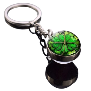 Lucky four-leaf clover metal keychain with double-sided glass ball pendant on white base