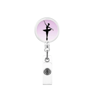 Retractable badge reel featuring pink ballet dancer silhouette design and PVC strap