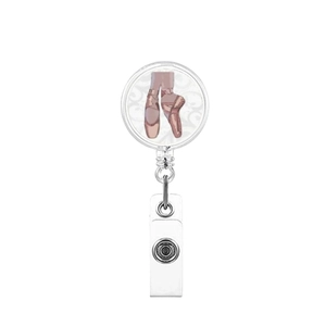 Detail of retractable badge reel featuring elegant ballet slippers on a white background