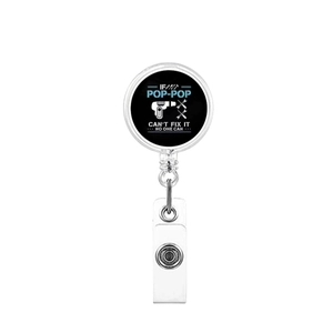 Detail of retractable badge reel featuring fix-it tools and a humorous grandpa message