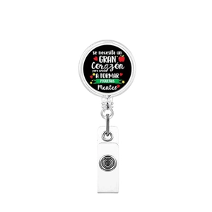 Detail of retractable badge reel with Spanish text and heart pattern for nurses