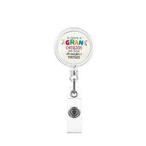 Detail of retractable ID badge reel with Spanish inspirational quote for teachers