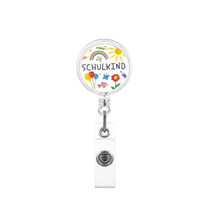 Detail of retractable badge holder featuring Schulkind text and colorful rainbow graffiti