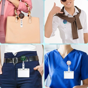 Detailed view of retractable badge holders with religious prints on scrubs and bags