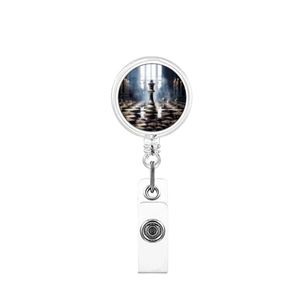 Macro detail of retractable badge reel featuring a chess king design and durable metal clip