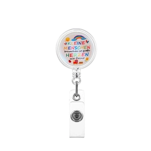 Detail of retractable ID badge reel with rainbow illustration and German motivational text