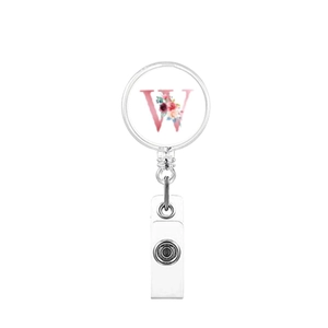 Detail of retractable badge holder with floral letter W print and durable PVC strap