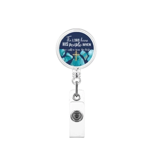 Retractable badge holder with turquoise texture and Christian Bible quote on blue surface