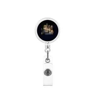 Detailed view of chess knight patterned retractable badge holder with metal hook