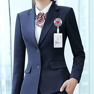 Close-up of Type 1 Diabetic medical alert badge reel and ID card holder on clothing