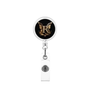 Detail of retractable badge reel with black floral butterfly and letter R print