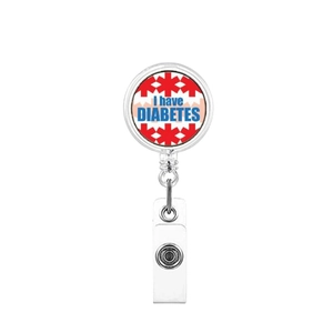 Macro detail of retractable ID badge reel with blue I have DIABETES medical alert text