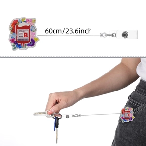 Detail showing retractable ID badge holder with blood bag design and 60cm extension cord