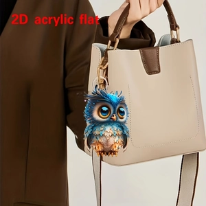 Cute 2D acrylic owl pendant as a car mirror ornament or keychain on a bag